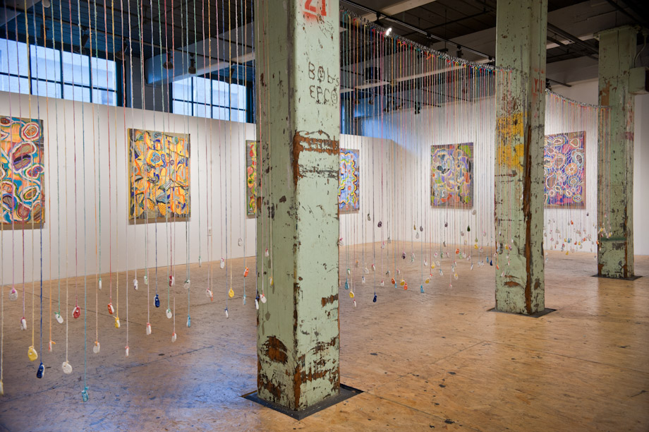 <em>Forget-Me-Not, String, ceramic and paint, installation dimensions may vary, 2015. </em> 